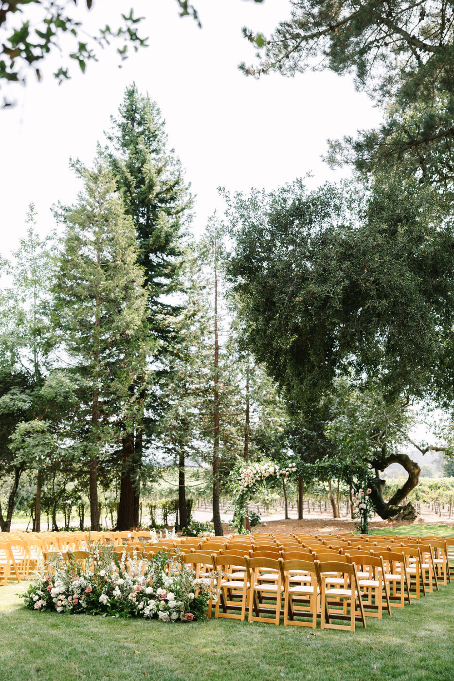 Kyndall and Blake's late summer wedding ceremony was held at the Oak Grove Estate event venue at Dutton Estate Winery in Sebastopol. (Amy Jordan)