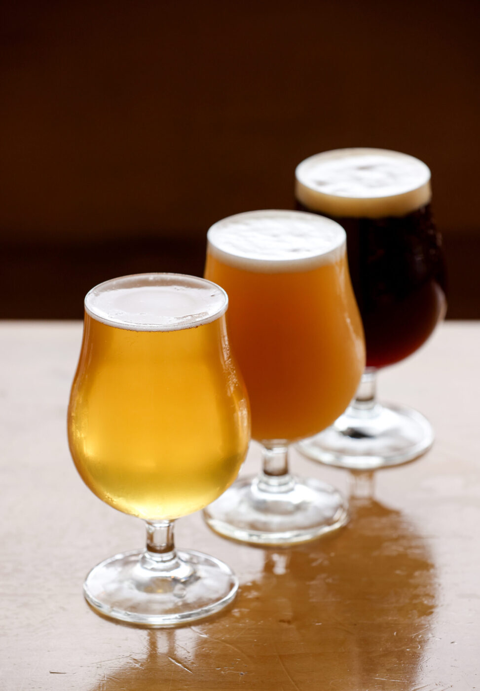 Parliament Brewing Company Pils, left, Kaleidoscope, and Brown Chicken Brown Cow beers in Rohnert Park on Wednesday, February 11, 2026. (Christopher Chung/The Press Democrat)