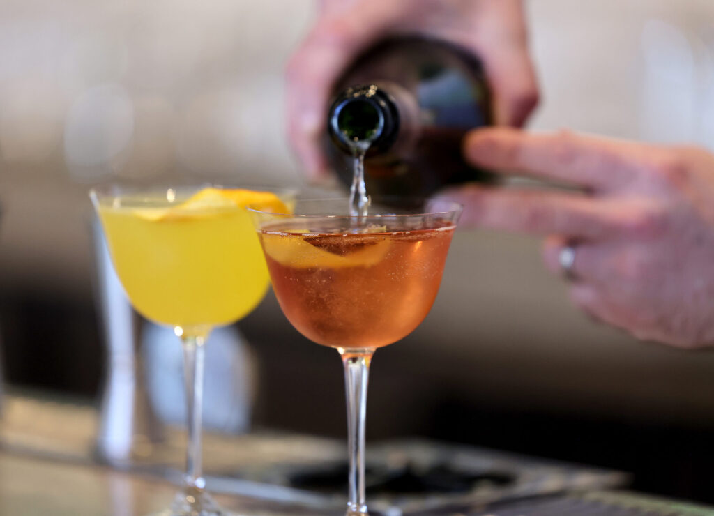 Chris Arntz pours a Violette Royale cocktail at Bijou Restaurant in Petaluma Sunday, Feb. 22, 2026. (Beth Schlanker / The Press Democrat)