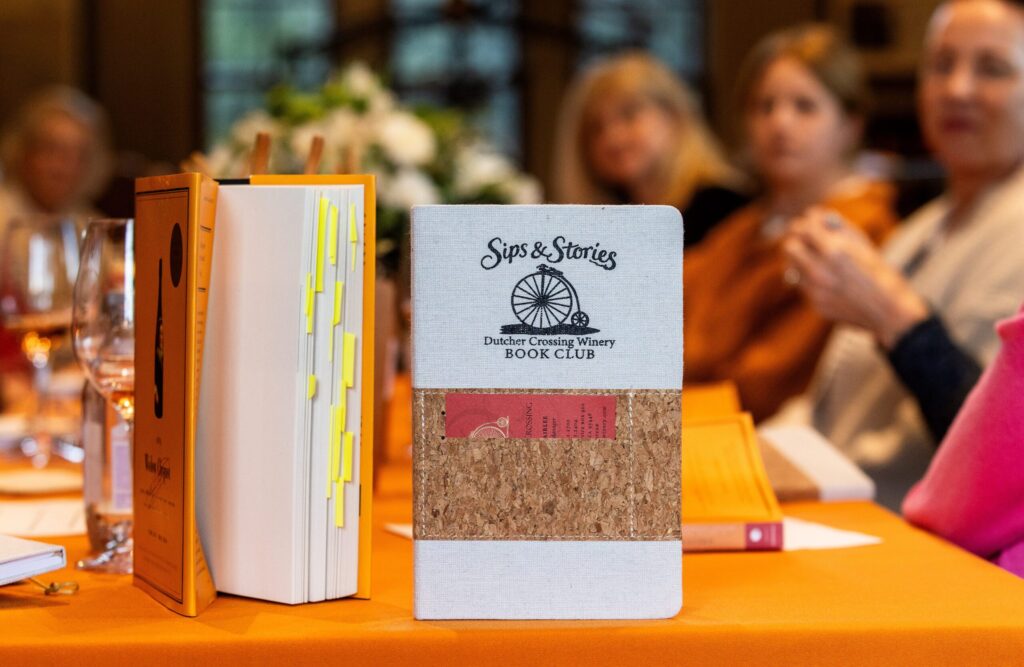 Before sitting down to discuss “The Widow Clicquot,” the Dutcher Crossing Winery Book Club paired the tale of the Grande Dame of Champagne with their Grace Reserve Brut Rose and a charcuterie cup Thursday Feb. 26, 2026 in the Dry Creek Valley. (John Burgess/The Press Democrat)