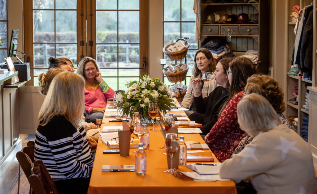 Before sitting down to discuss “The Widow Clicquot,” the Dutcher Crossing Winery book club paired the tale of the Grande Dame of Champagne with their Grace Reserve Brut Rose and a charcuterie cup Thursday Feb. 26, 2026 in the Dry Creek Valley. (John Burgess/The Press Democrat)