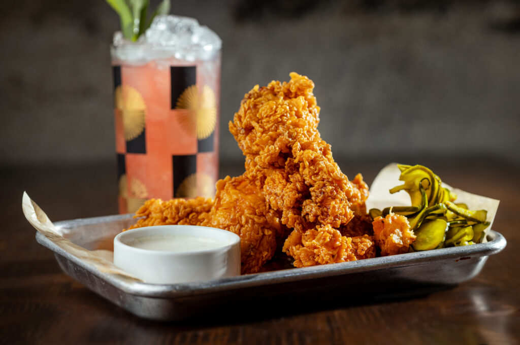 Almost Famous Chicken Tendies, hot or not, L&B ranch and mason’s pickles from Lo and Behold Bar and Kitchen Monday, March 30, 2026 in Healdsburg. (John Burgess/The Press Democrat)