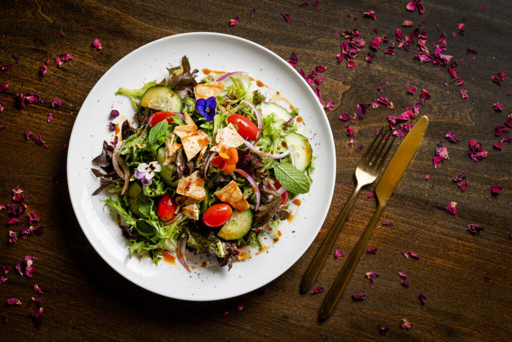 Fattoush with tomato, cucumber, onion, mint, sumac and crispy pita from the lunch-only menu at Mazza Levantine Kitchen Thursday, March 26, 2026 in northeast Petaluma. (John Burgess / The Press Democrat)