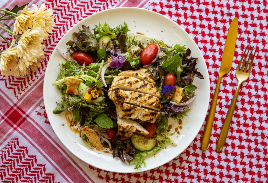Fattoush with grilled chicken, tomato, cucumber, onion, mint, sumac and crispy pita from the lunch-only menu at Mazza Levantine Kitchen Thursday, March 26, 2026 in northeast Petaluma. (John Burgess / The Press Democrat)