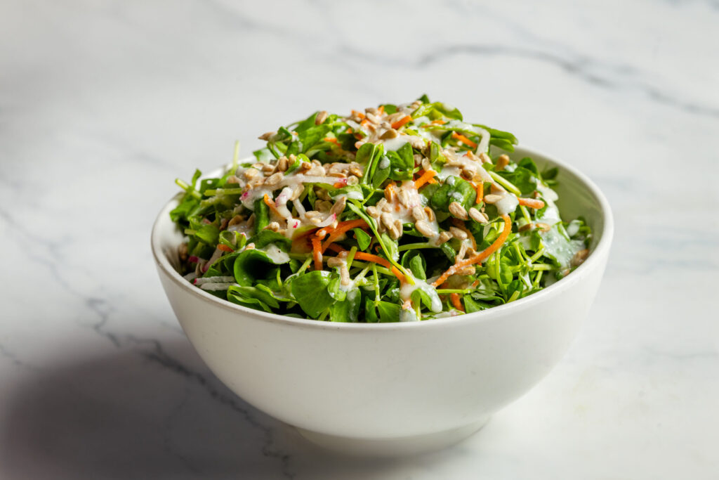 Pea Shoots with sesame, yogurt and sunflower seeds from Lo and Behold Bar and Kitchen Monday, March 30, 2026 in Healdsburg. (John Burgess/The Press Democrat)