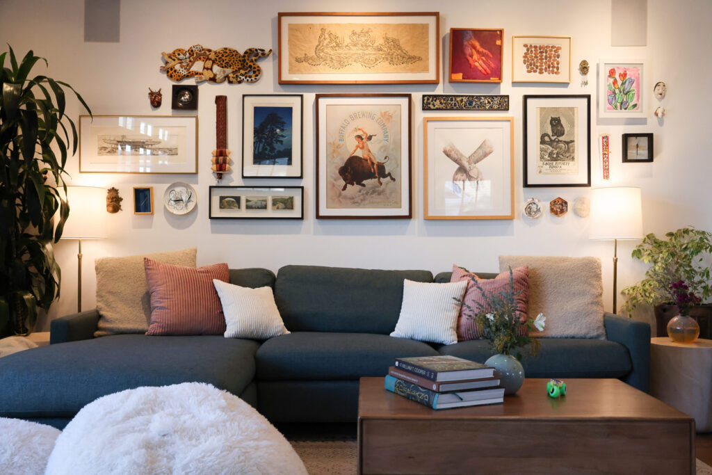 A collection of art by a variety of artists hang on the living room wall of Jake and Corrin Messing’s home in Healdsburg on Friday, February 6, 2026. (Christopher Chung/The Press Democrat)