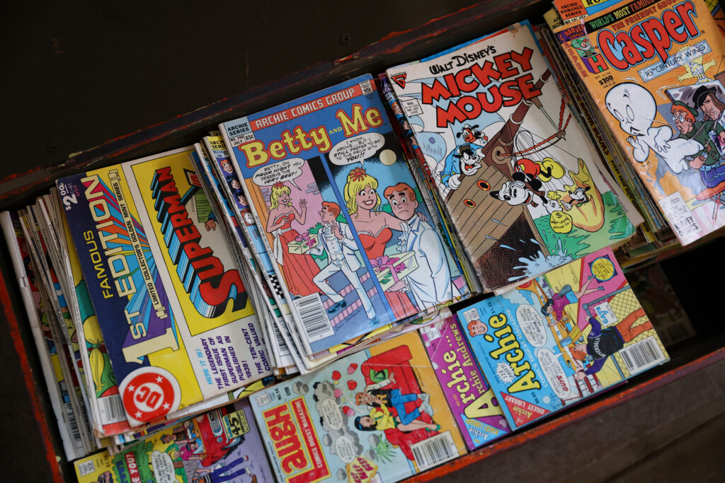 A chest full of comic books printed on the printing press operated by Jake Messing’s grandfather, Roswell Messing, provides fun reading material for Jake’s three children. Photo taken in Healdsburg on Friday, February 6, 2026. (Christopher Chung/The Press Democrat)