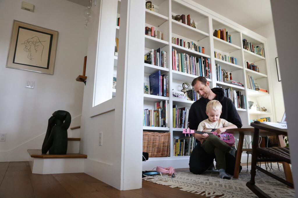 Jake Messing plays with his 2-year-old son Leo at home in Healdsburg on Friday, February 6, 2026. (Christopher Chung/The Press Democrat)