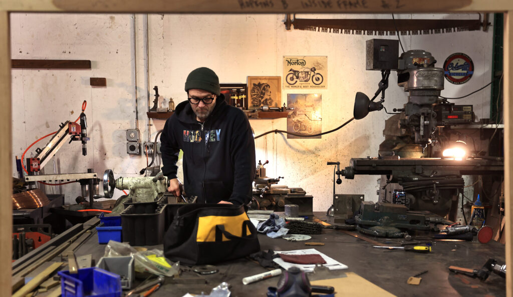 Klaus Rappensperger sizes material for a custom metal project at Schnitzkraft Steel Artistry in Santa Rosa, Tuesday, Feb. 10, 2026. (Kent Porter / The Press Democrat)