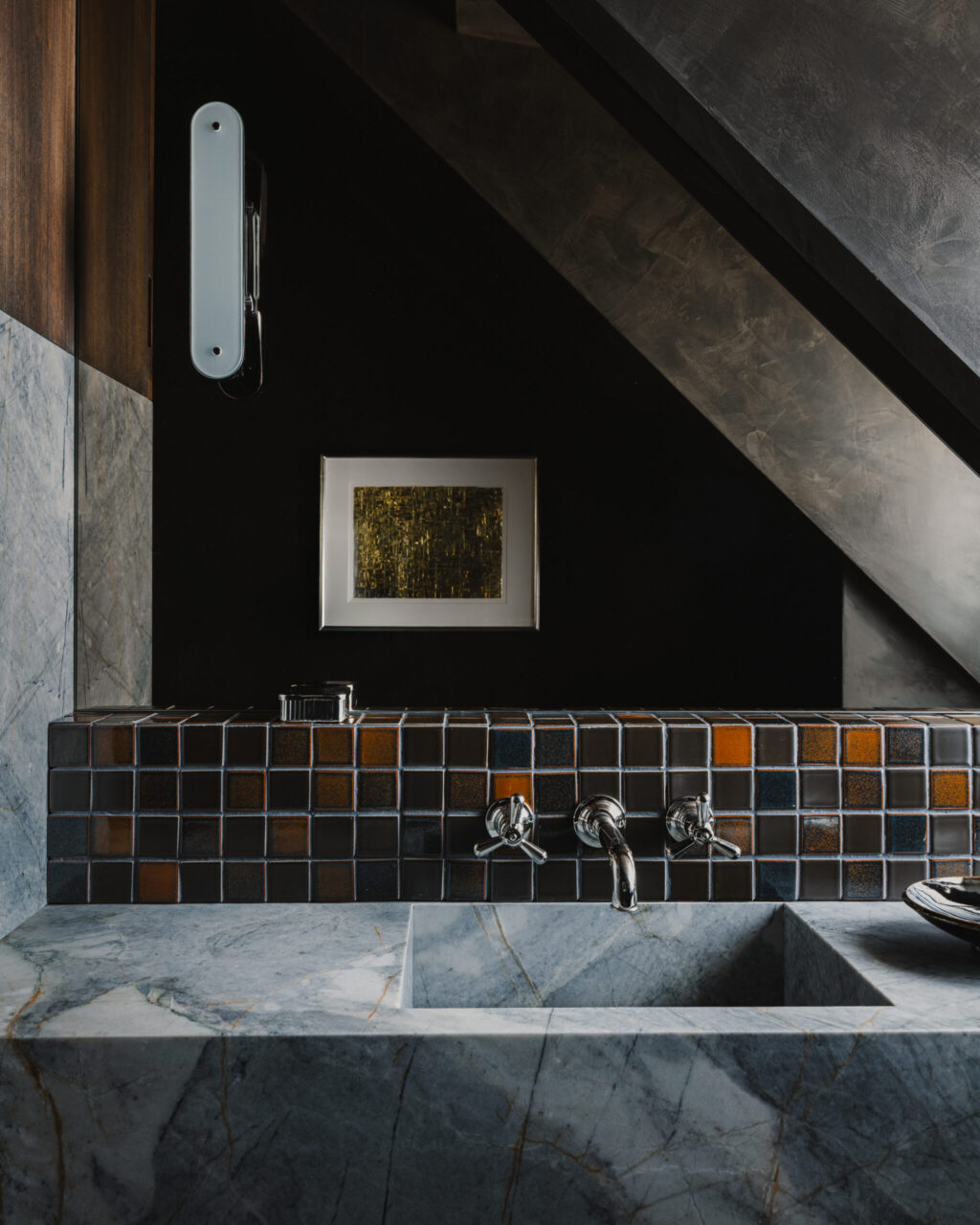 A variety of tiles—handmade by McIntyre Tile—were picked by designer Alexander Nikban of Studio Alexander to add texture and color to this bathroom. (Dane Deaner)