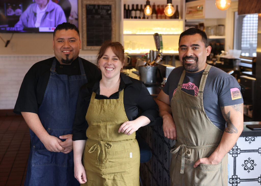 (From left) Owners Gerardo Reyes, Hayley Cutri and her husband Efrain Balmes at Parkside Eats in Santa Rosa Monday, April 13, 2026. (Beth Schlanker / The Press Democrat)