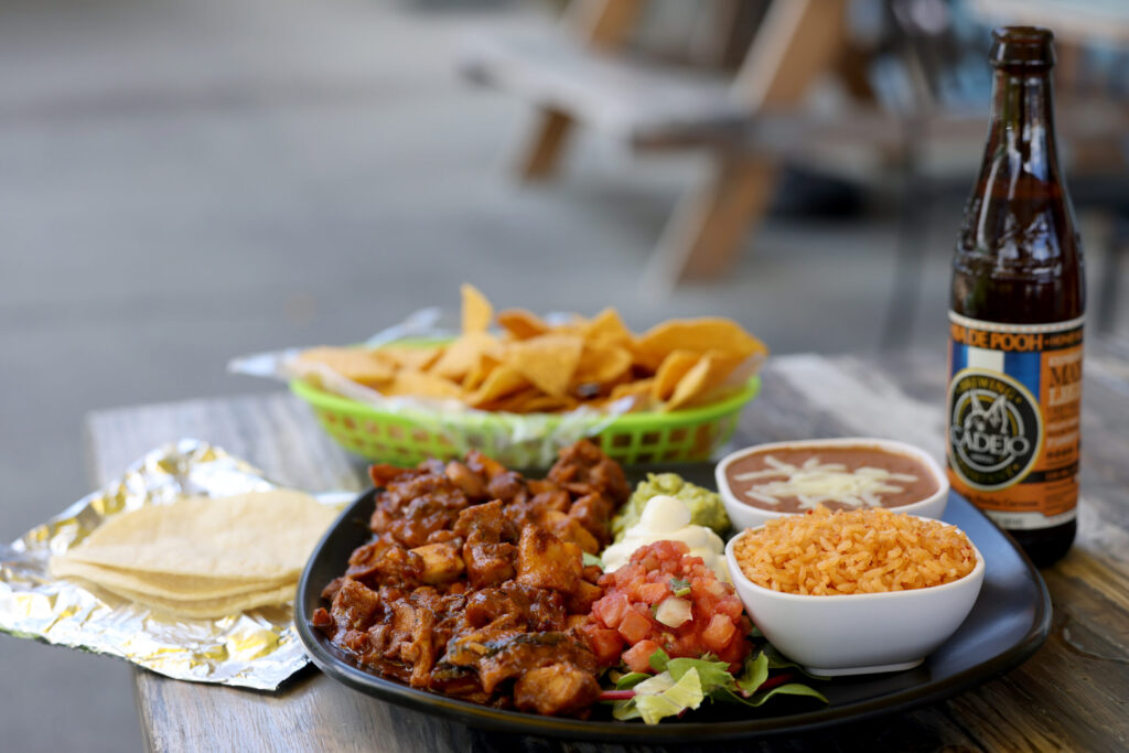 The orange marinated chicken plate served with tortillas, rice and beans at Don Julio's Latin Grill in Rohnert Park Monday, April 13, 2026. (Beth Schlanker / The Press Democrat)