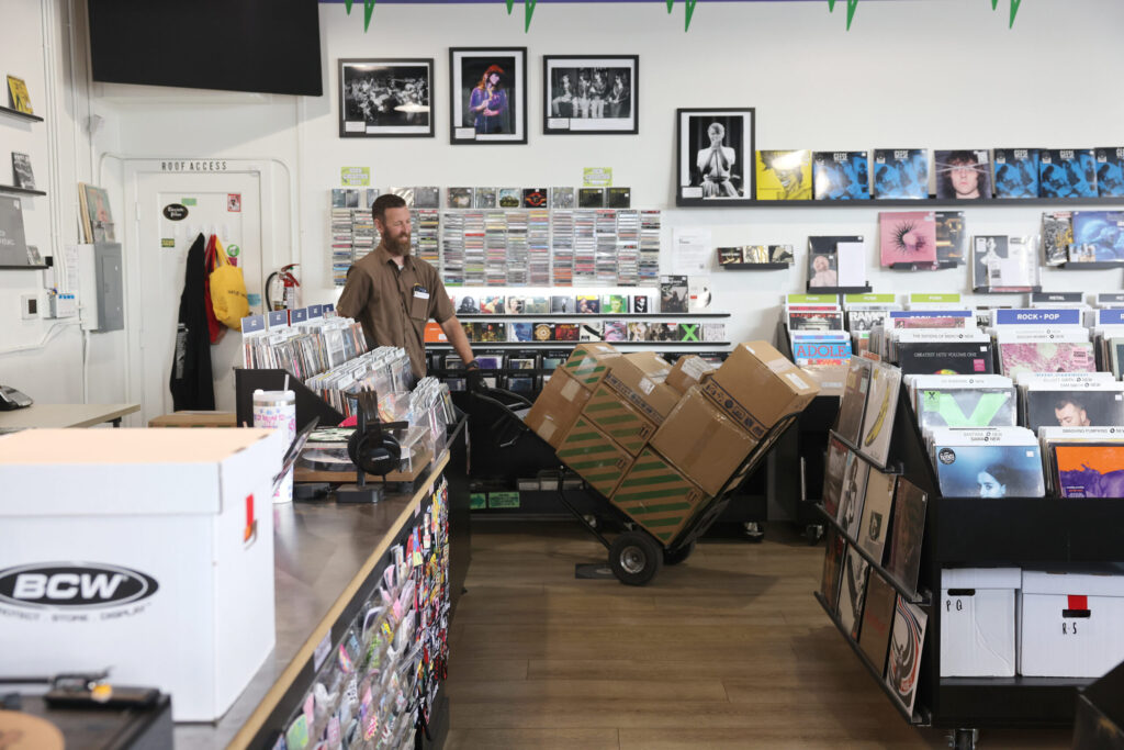 John Elward delivers boxes records for the upcoming Record Store Day at Paradise Found Records and Music in Petaluma Tuesday, April 14, 2026. (Beth Schlanker / The Press Democrat)