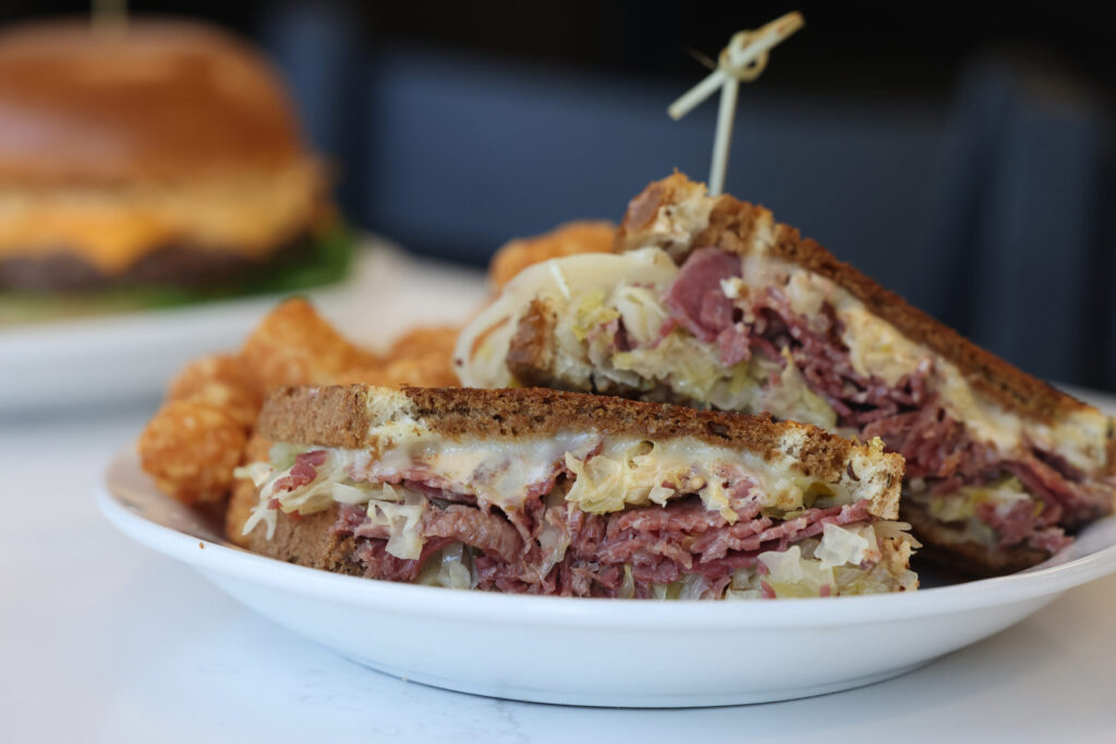 The Rueben sandwich with tater tots at Pressed in Rohnert Park Friday, April 17, 2026. (Beth Schlanker / The Press Democrat)