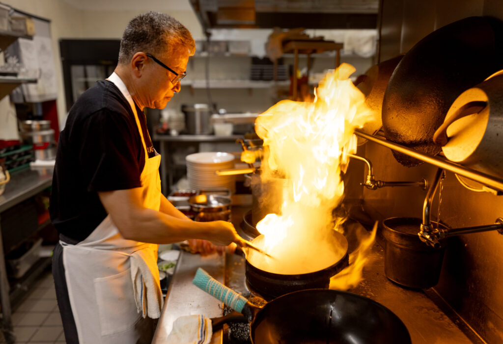 Chef Christopher Chu runs the kitchen at Osake Japanese restaurant, while brother Gary entertains guests at the sushi bar and runs the front of the house Thursday, April 3, 2026 in Santa Rosa. (John Burgess / The Press Democrat)