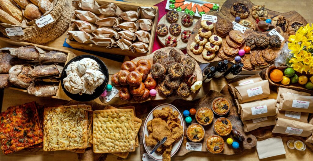 The daily goodies table at Pastasciutta filled with sweet treats, to-go sandwiches, Ligurian-style focaccia, breads and more Thursday, April 2, 2026 in Geyserville. (John Burgess/The Press Democrat)