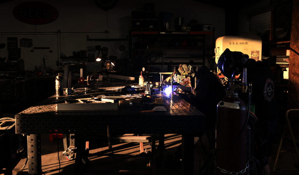 Custom fabricator Justin Warren welds as he works on a custom project at Schnitzkraft Steel Artistry in Santa Rosa, Thursday, Jan. 29, 2026. (Kent Porter / The Press Democrat)