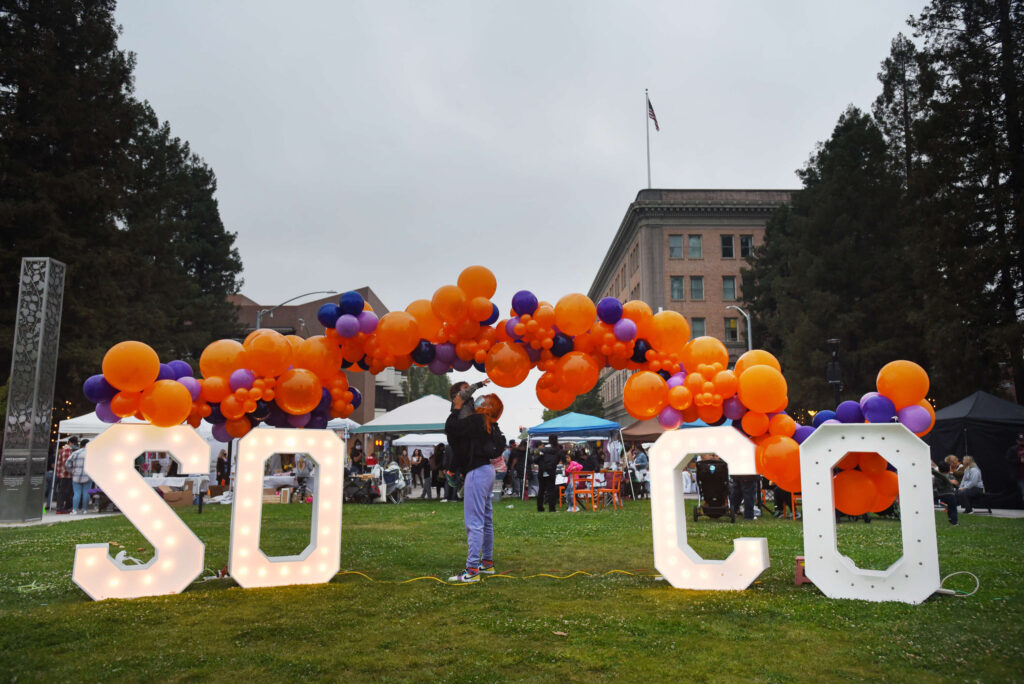 Valeria Garcia with her 1-year-old son Malachi Garcia at The SoCo Market held at Old Courthouse Square in downtown Santa Rosa on Friday, Aug. 20, 2021. (Erik Castro/for The Press Democrat)
