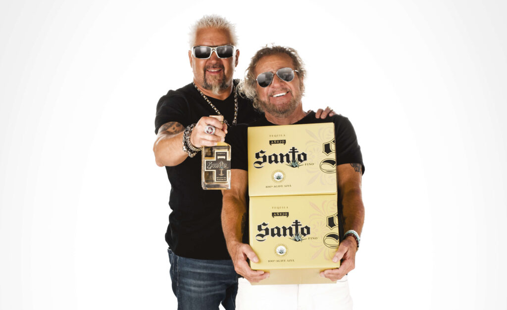 Sonoma County celebrity chef Guy Fieri and rock 'n' roll front man Sammy Hagar pose with their Santo Tequila, which they founded in 2019. (Santo Tequila)