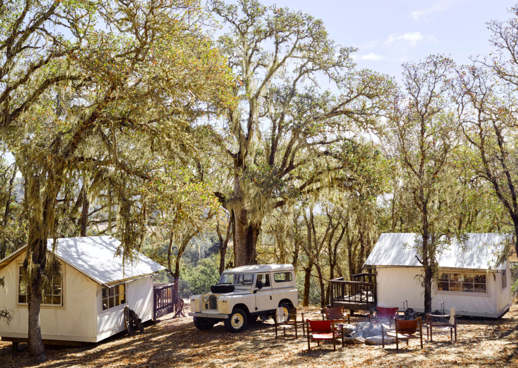 Year-round tents and the property’s vintage Land Rover. Designer Ken Fulk in the entertainment barn. (Douglas Friedman)