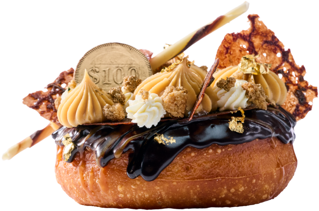 The Millionaire’s Doughnut, filled with chocolate-hazelnut cream, gilded with gold leaf and served with a 1-ounce pour of Louis XIII Cognac, from SoCo Dough Co. at Graton Resort & Casino in Rohnert Park. (Graton Resort & Casino)