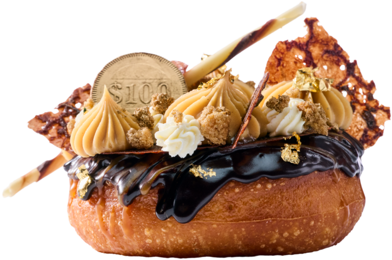 The Millionaire’s Doughnut, filled with chocolate-hazelnut cream, gilded with gold leaf and served with a 1-ounce pour of Louis XIII Cognac, from SoCo Dough Co. at Graton Resort & Casino in Rohnert Park. (Graton Resort & Casino)