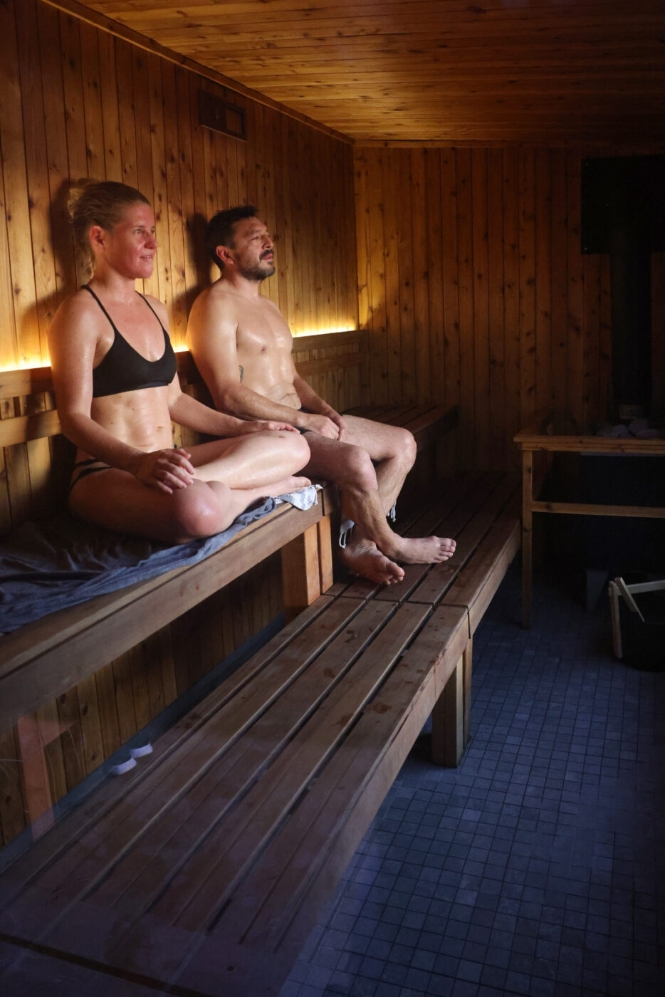 Jasmine Flanigan and her partner Eduardo Torres relax in the sauna at Sundrop Sauna in Petaluma Sunday, Nov. 30, 2025. (Beth Schlanker / The Press Democrat)