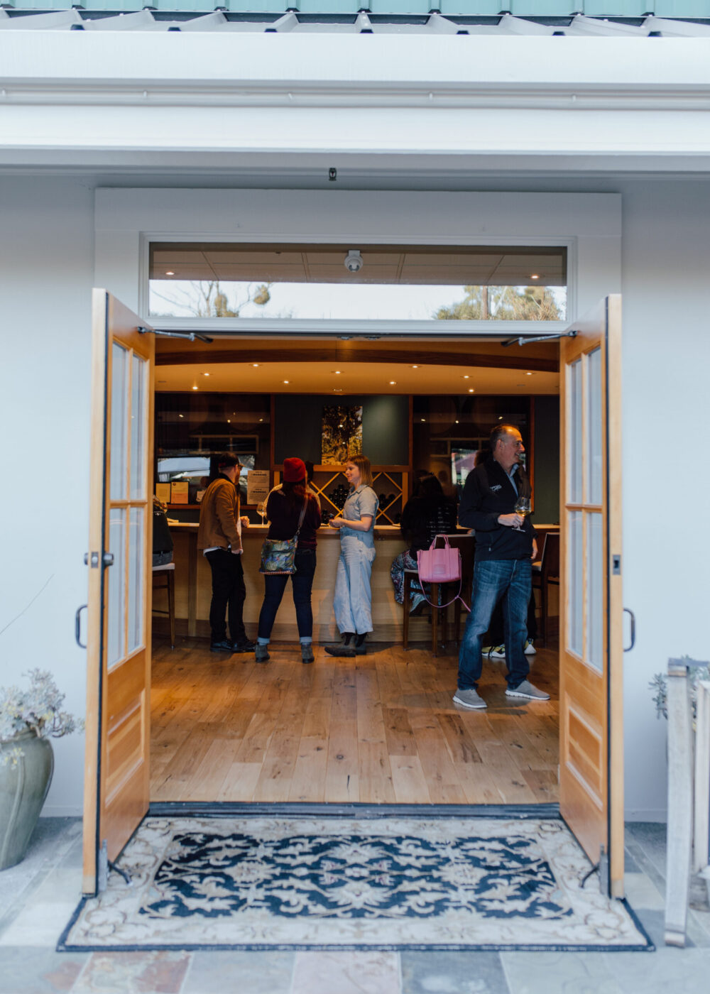 At Dutton-Goldfield Winery in Sebastopol, happy hour events reflect a deliberate shift toward more social experiences. On the third Thursday of each month, the winery invites walk-in visitors to enjoy discounted wines by the glass and bottle service. Small bites are free. (Courtesy of Dutton-Goldfield Winery)