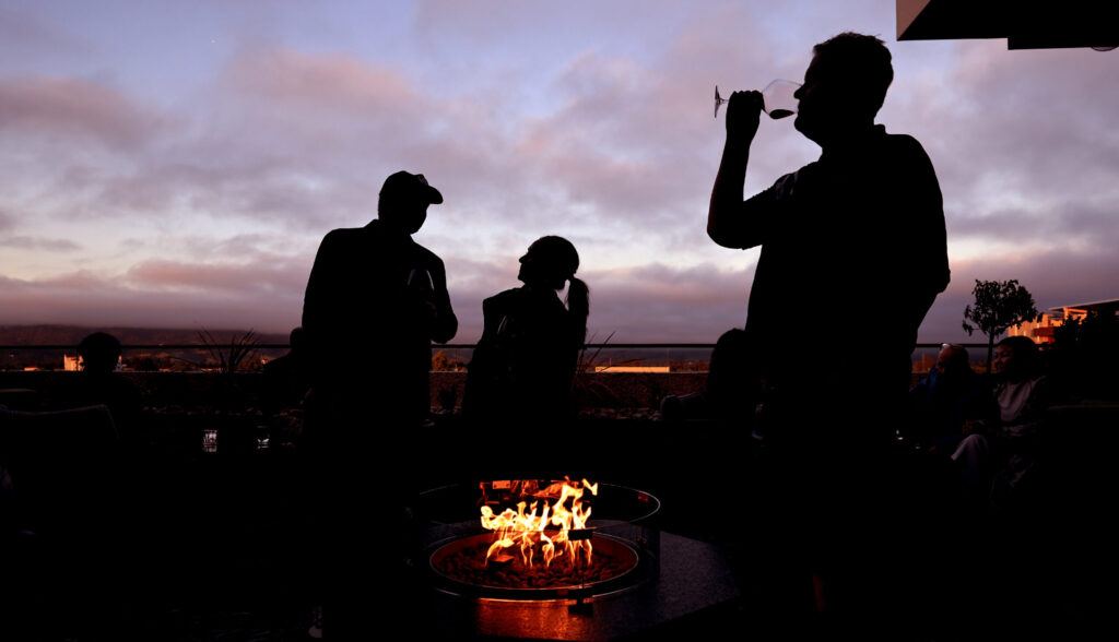 People take in a sunset on the the rooftop sports bar and Aya Restaurant, Thursday, May 7, 2026, during the Graton Resort and Casino grand opening, Thursday, May 7, 2026, near Rohnert Park. (Kent Porter / The Press Democrat)