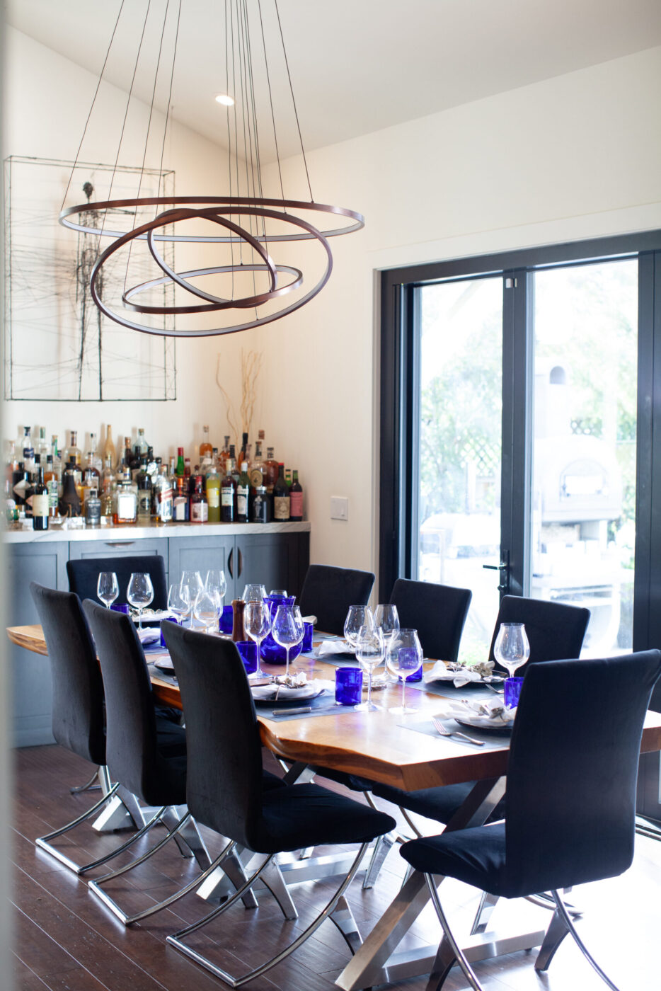 The Silvers family sits down for dinner every night at a custom dining table made with reclaimed redwood. (Eileen Roche)