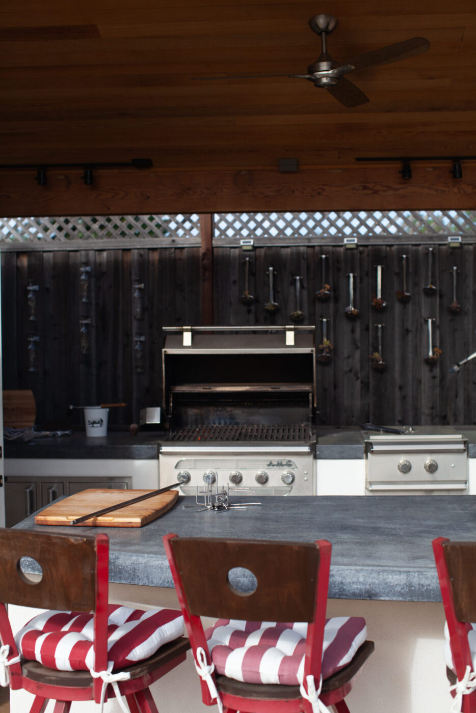 The outdoor kitchen and bar area in the backyard of Josh and Regina Silvers’ home in Santa Rosa. (Eileen Roche)