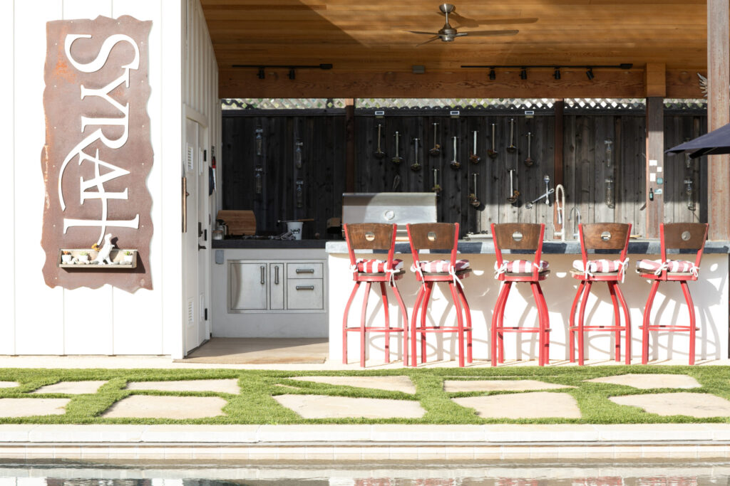 The outdoor kitchen and bar area in the backyard of Josh and Regina Silvers’ home in Santa Rosa. (Eileen Roche)