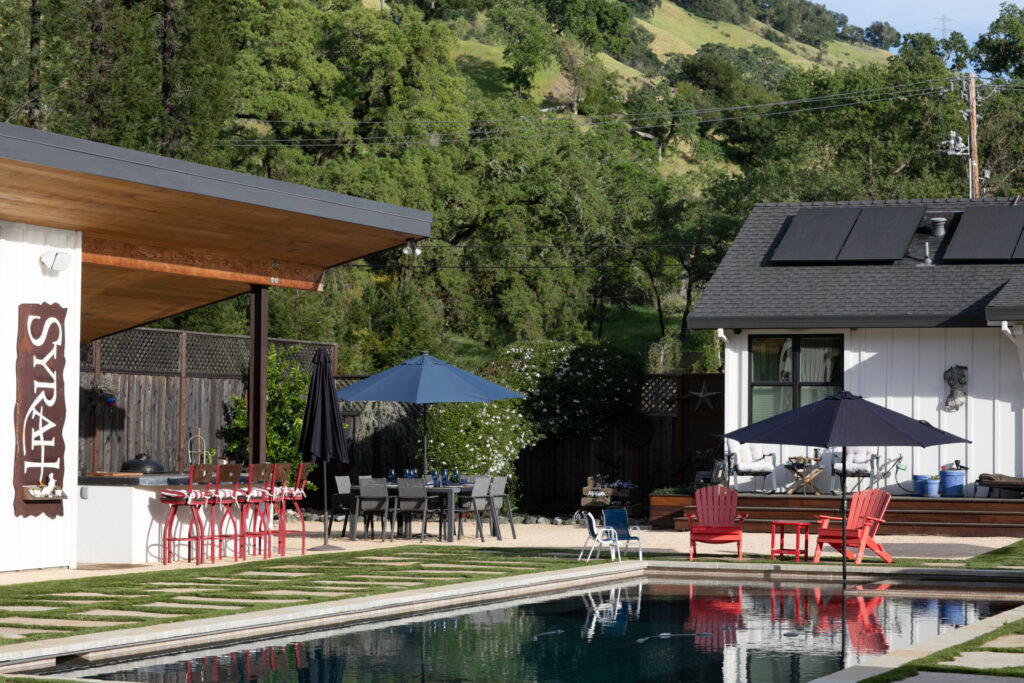 The backyard of Josh and Regina Silvers’ home is the setting for many gatherings with a host of family and friends. (Eileen Roche)