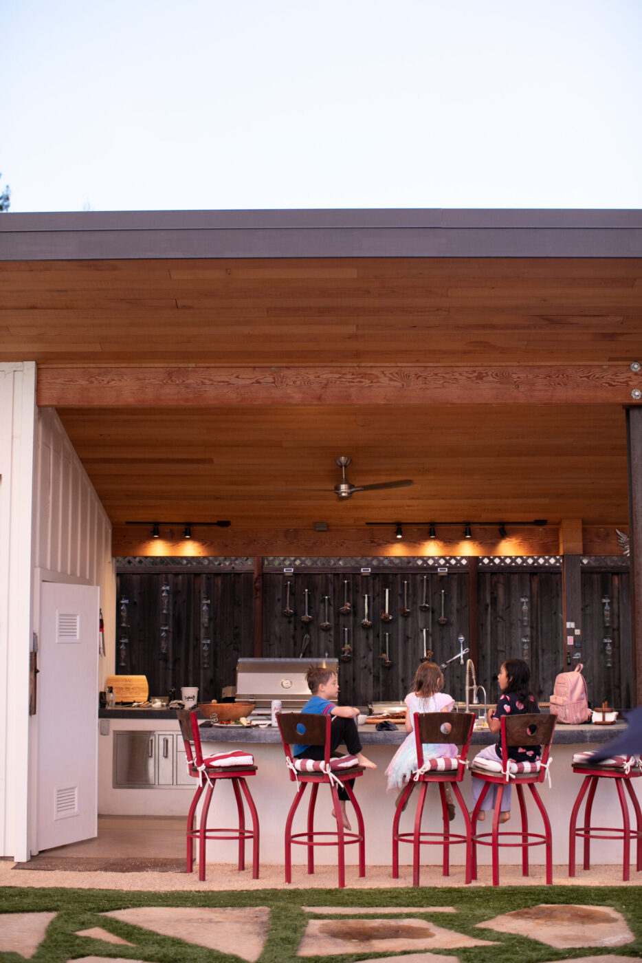 The backyard of Josh and Regina Silvers’ home is the setting for many gatherings with a host of family and friends. (Eileen Roche)
