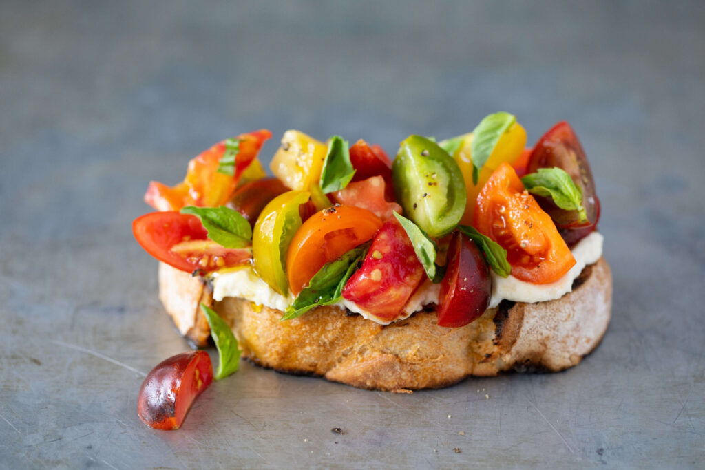 An Heirloom Tomato Bruschetta from Gott’s Roadside features Bellwether Farms ricotta, tomatoes, olive oil and basil. (Gott’s Roadside)