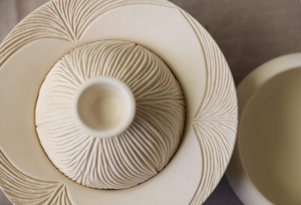 Intricate designs etched into a ceramic piece by Jee Park, of Seoul Sister Studio, in Healdsburg on Thursday, March 19, 2026. (Christopher Chung/The Press Democrat)