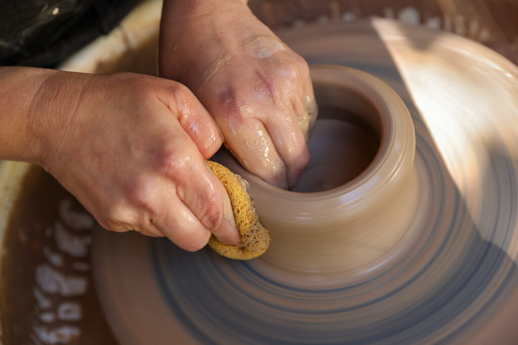 Hannah Allen works on her pottery wheel at her studio in Santa Rosa on Monday, March 23, 2026. (Christopher Chung/The Press Democrat)