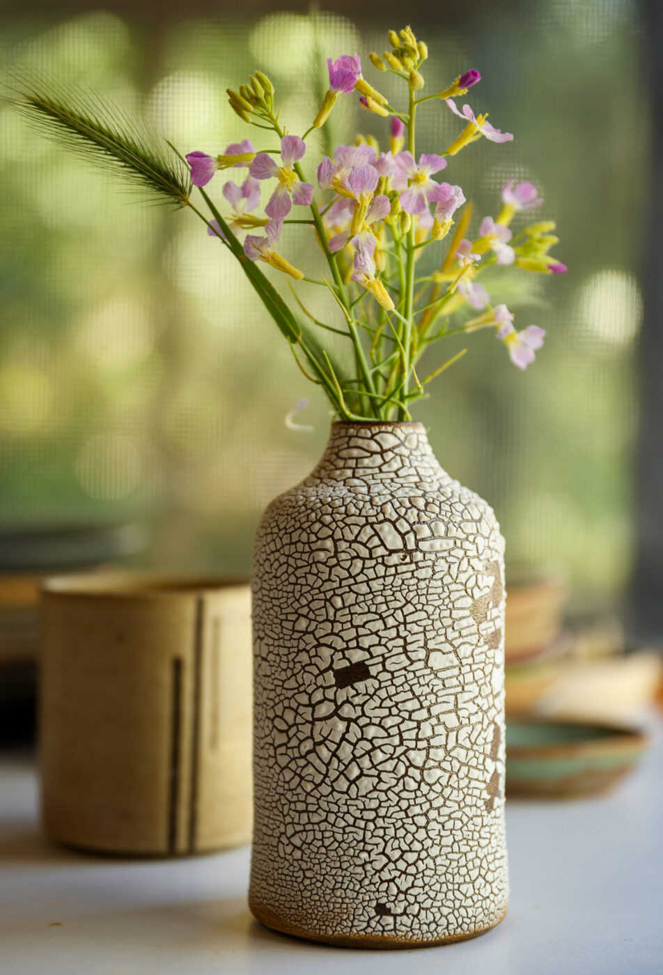 A crackle vase made by Hannah Allen in Santa Rosa on Monday, March 23, 2026. (Christopher Chung/The Press Democrat)