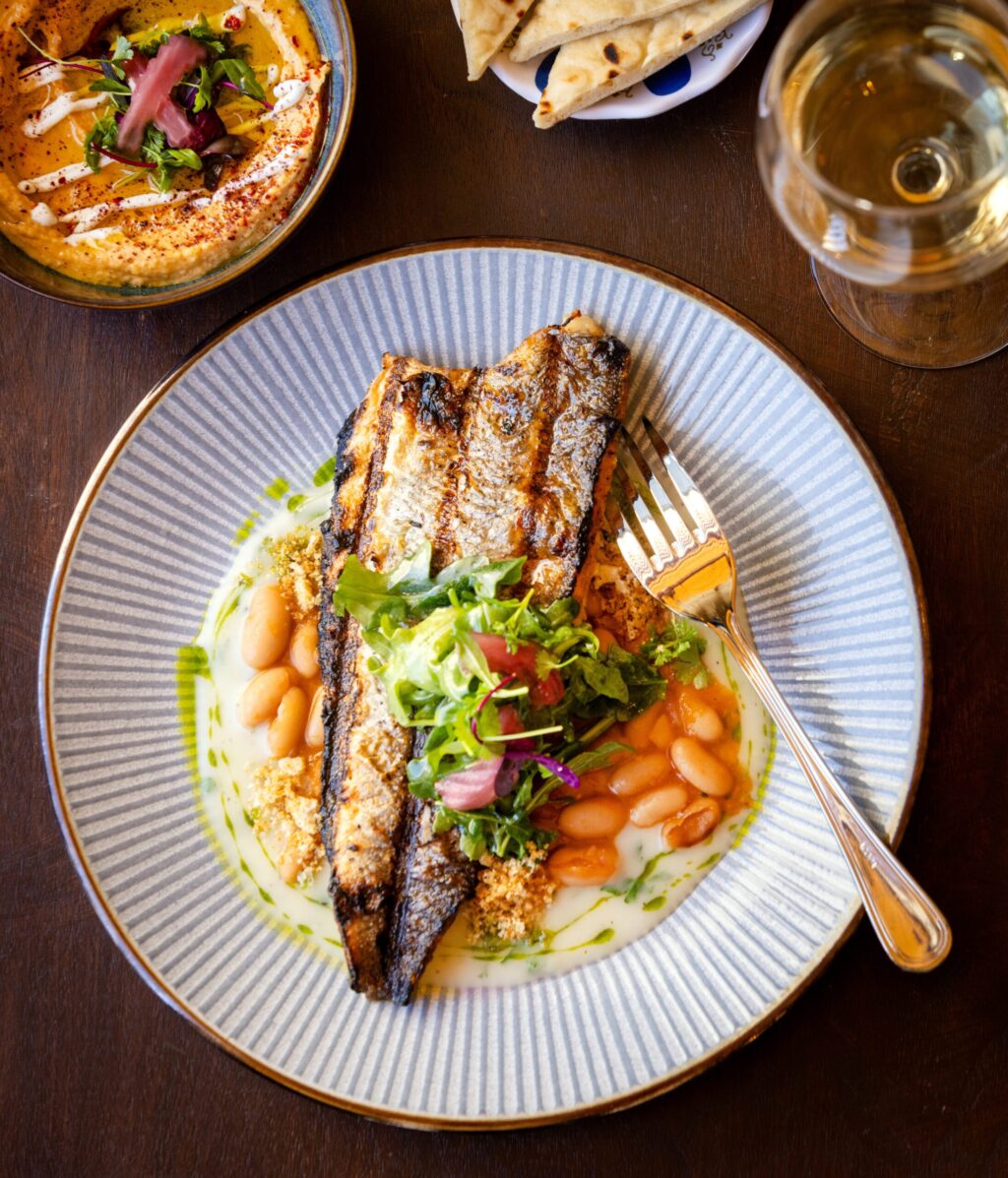 Branzino with fasolada, velouté and croutons from Alesta Modern Mediterranean Wednesday, June 3, 2026 in Sebastopol. (John Burgess/The Press Democrat)