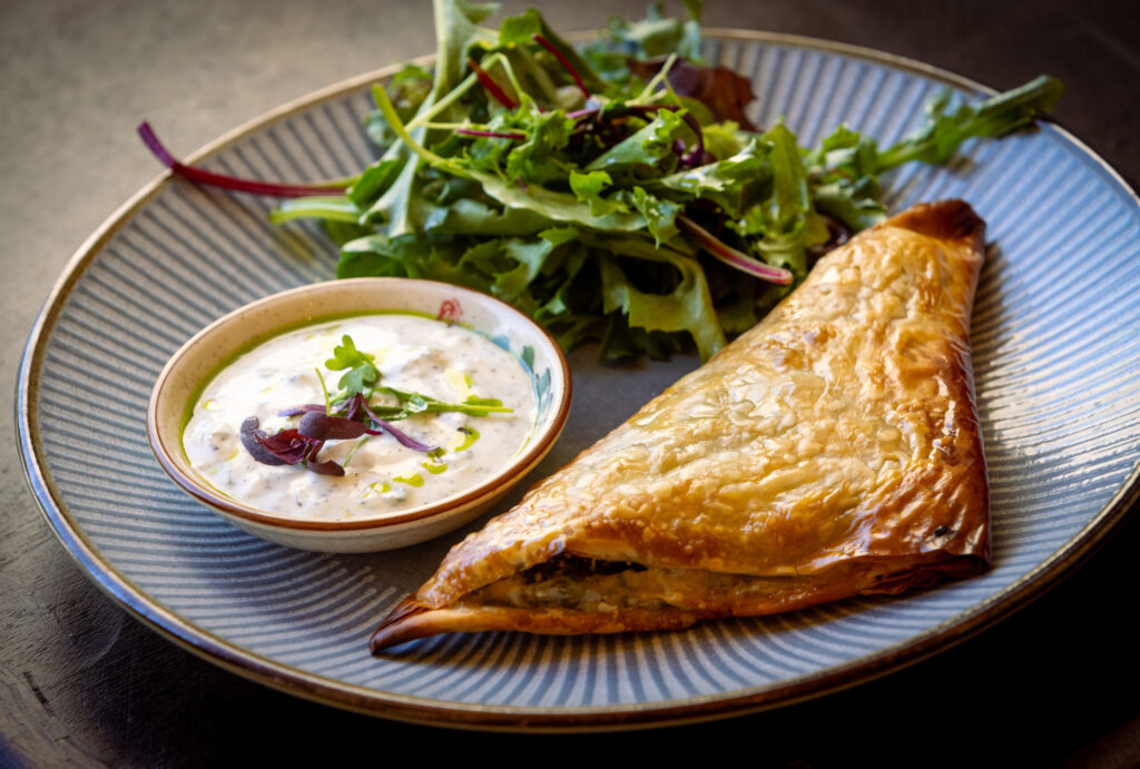 Spanakopita with spinach, feta and onion from Alesta Modern Mediterranean Wednesday, June 3, 2026 in Sebastopol. (John Burgess/The Press Democrat)