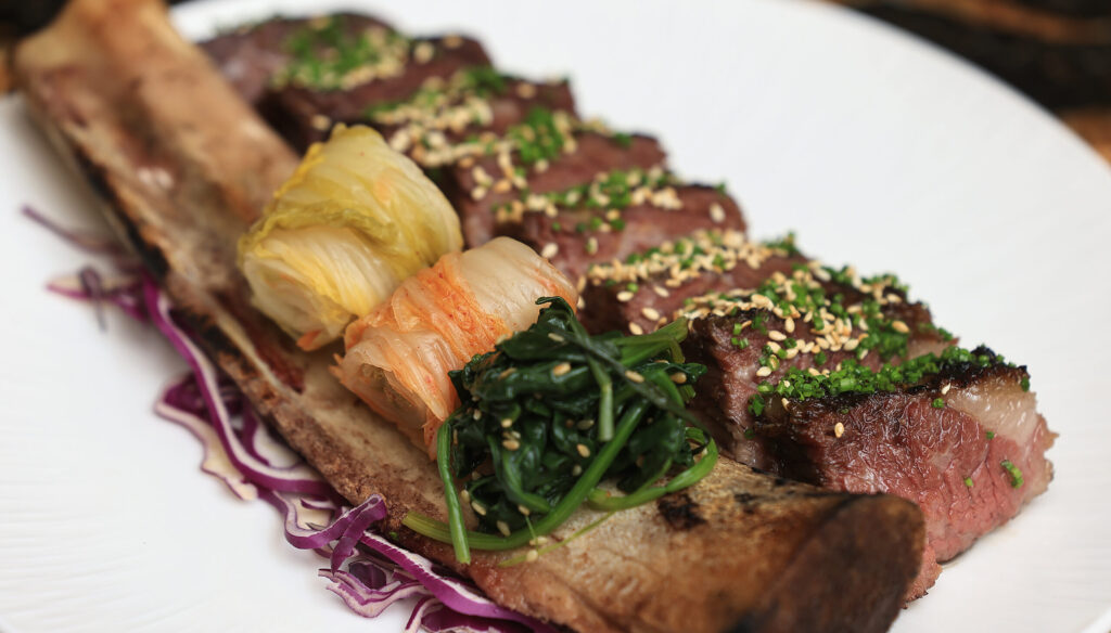 Fireplace short rib with season kimchi at AYA, located inside Graton Resort and Casino, Wednesday, June 17, 2026. (Kent Porter / The Press Democrat)