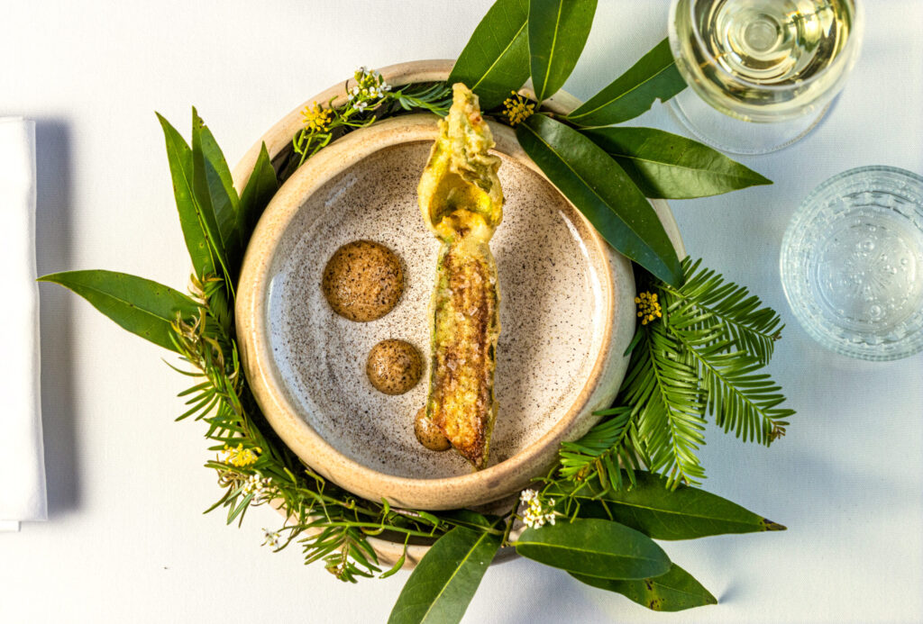 For the weekly chef’s Amuse Busch, Tempura Squash with the Blossom attached with charred fennel aioli and dusted with a black trumpet powder from the Bohemian Bistro Friday, June 12, 2026 in Occidental. (John Burgess/The Press Democrat)