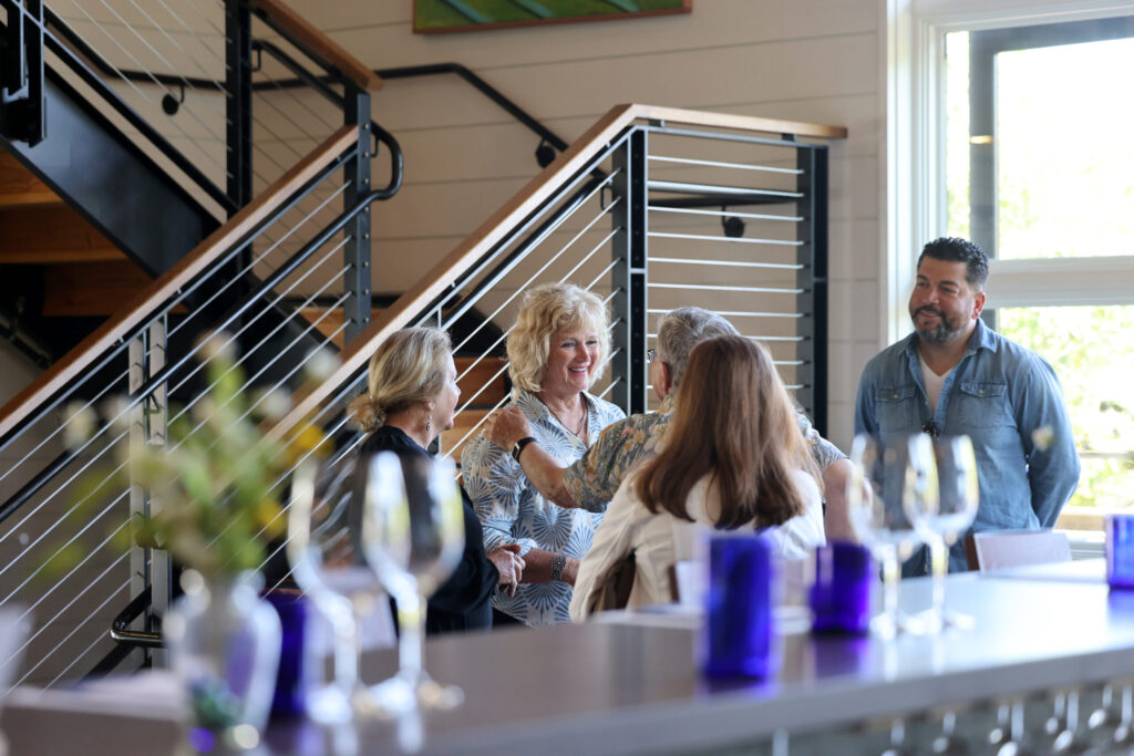 Heidi Peterson Barrett talks with guests at La Sirena tasting room in Calistoga Wednesday, May 13, 2026. (Beth Schlanker / The Press Democrat)