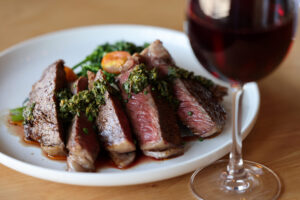 The Wagyu Ribeye with chimichurri, mashed potatoes and broccolini at Seared in Petaluma Thursday, June 18, 2026. (Beth Schlanker / The Press Democrat)