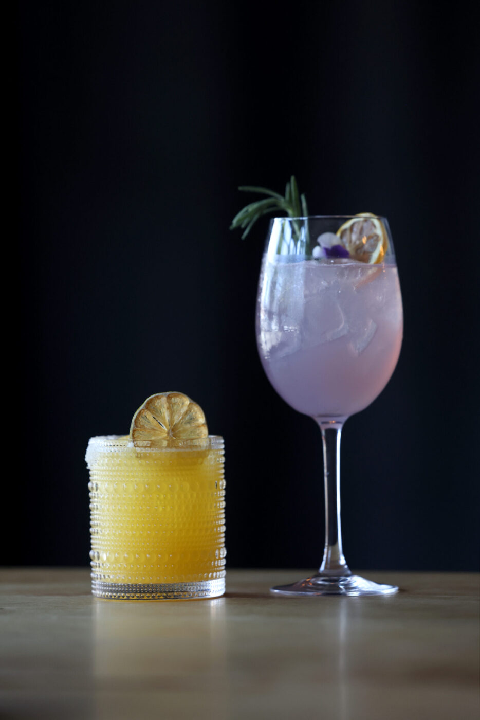 The Bon Vivant cocktail, left, and the Lavender Spritz cocktail at Seared in Petaluma Thursday, June 18, 2026. (Beth Schlanker / The Press Democrat)