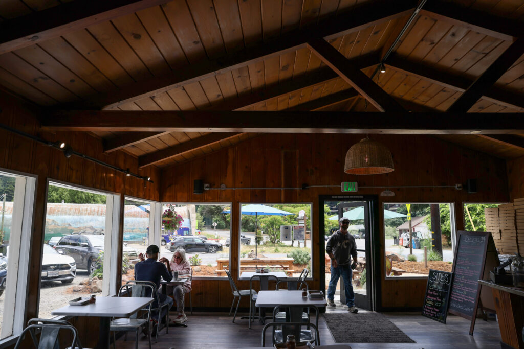 The indoor dining area of Wonderland Pizzeria in Monte Rio on Wednesday, June 17, 2026. (Christopher Chung/The Press Democrat)