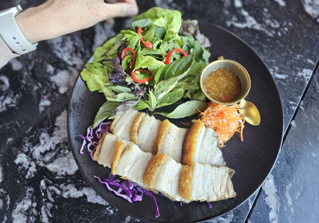 Pork belly lechon from AYA Sonoma at the Graton Resort & Casino in Rohnert Park. (Heather Irwin / The Press Democrat)