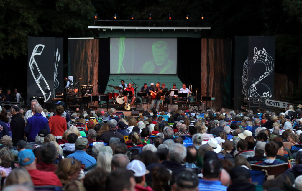 Brian Nova performs on stage with a band during the 112th annual Monte Rio Variety Show at the Monte Rio Amphitheater in Monte Rio, Thursday, July 27, 2023. (Darryl Bush / For The Press Democrat)