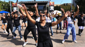 Sonoma County 55th Annual MLK/Juneteenth Festival participants dance in a Zumba demonstration, Saturday, June 14, 2025. (Kent Porter / The Press Democrat)