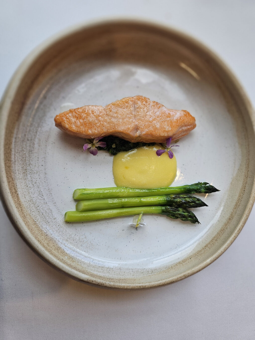 Locally sourced king salmon with an airy lemongrass hollandaise on the tasting menu at Bohemian Bistro in Occidental. (Heather Irwin / The Press Democrat)
